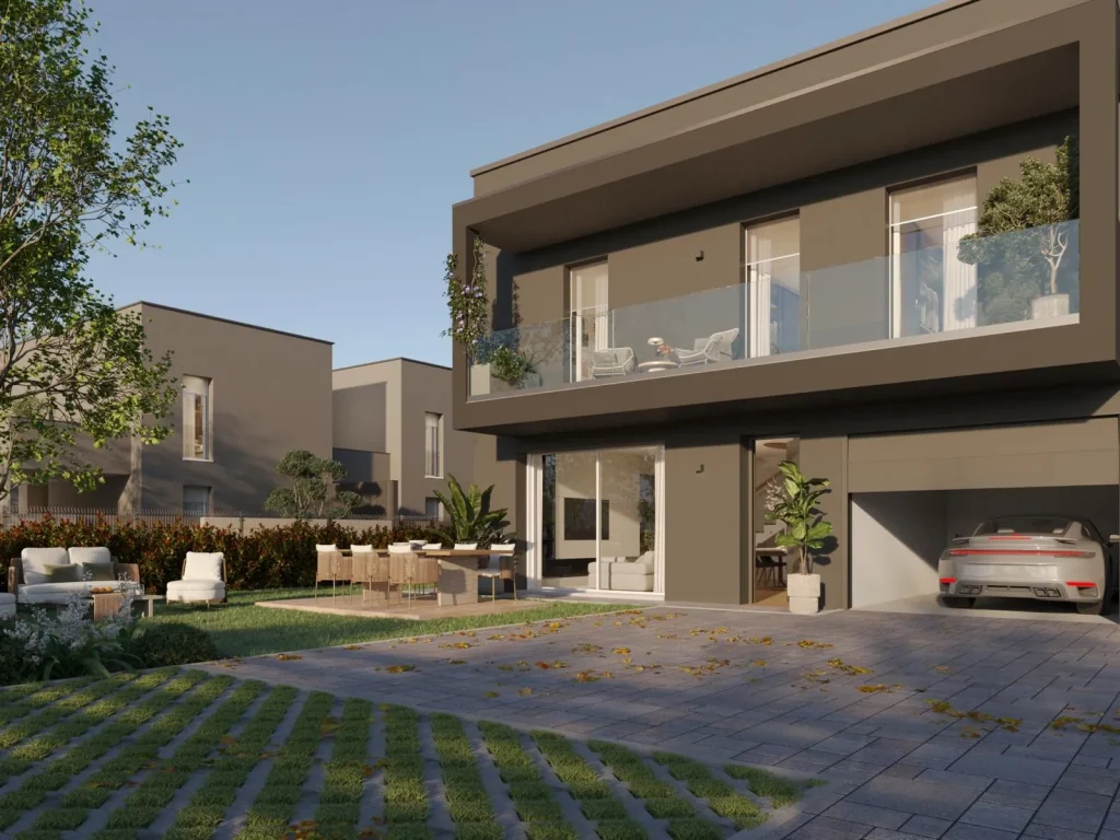 Villa a due piani con terrazzo vetrato, box auto e giardino a Residenze Corte Verde